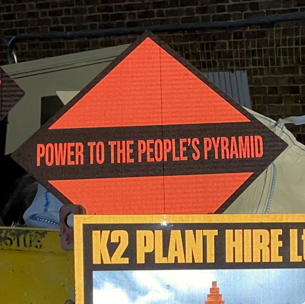 Power to The Peoples Pyramid Sign