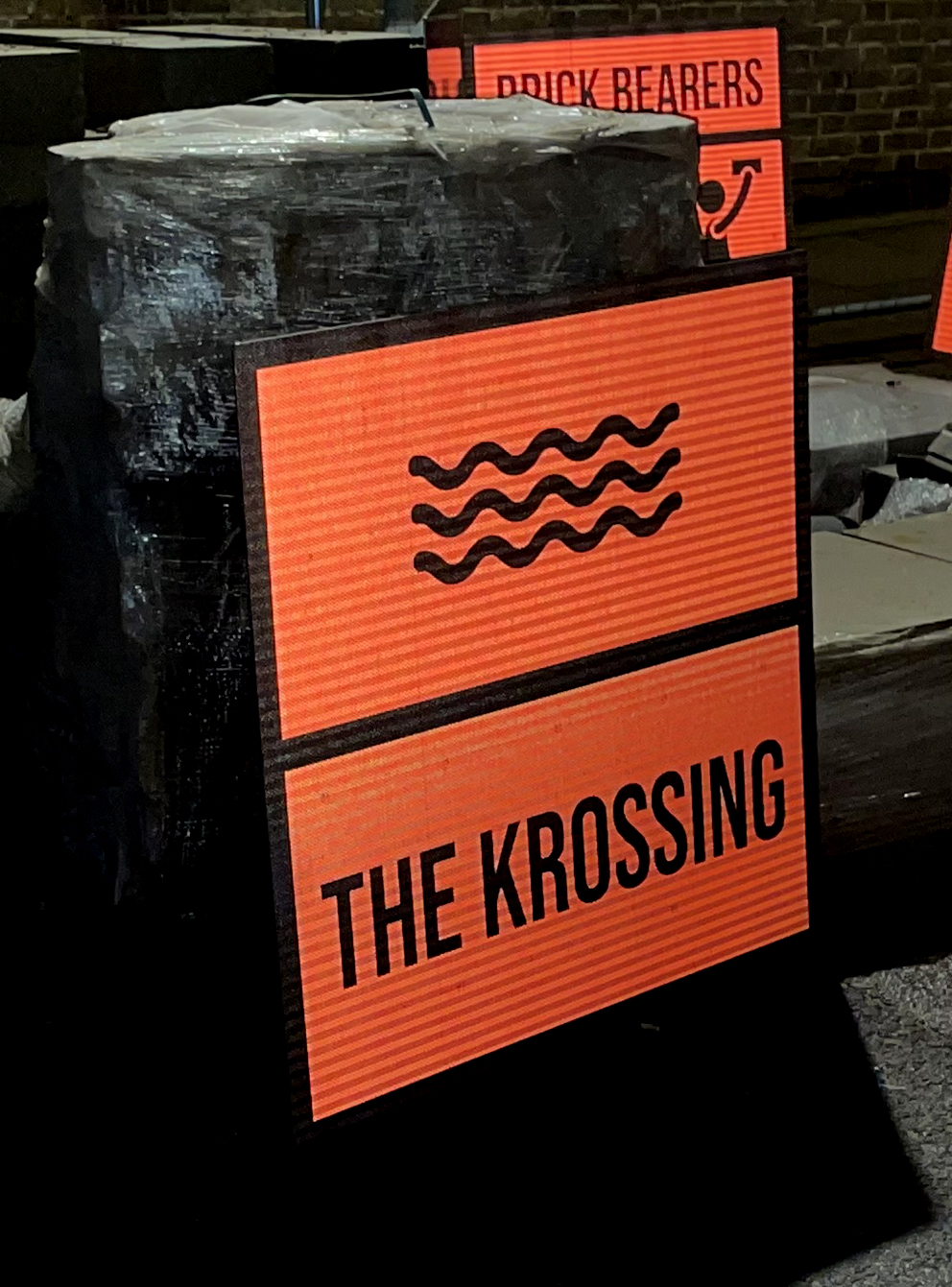 The Krossing Site Sign Red